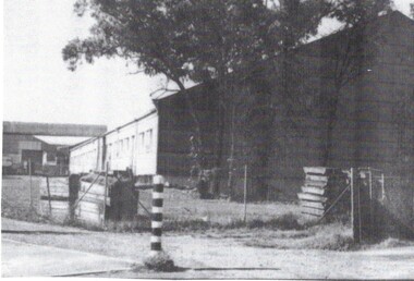 B/W strip photo of Cool Stores.