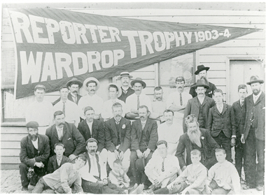 Black and white photo of Reporter Wardrop Trophy Cricket Team