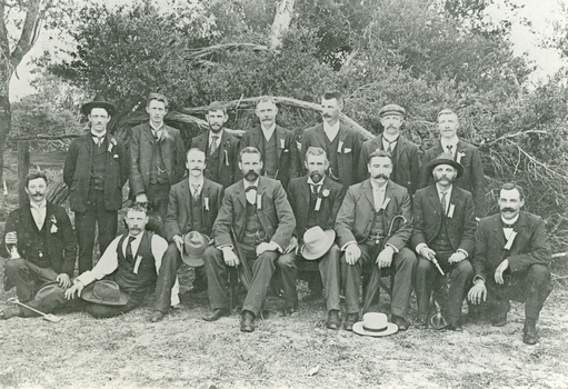 Black and white photo of men at picnic from the Australian Tessellated Tile Company. 