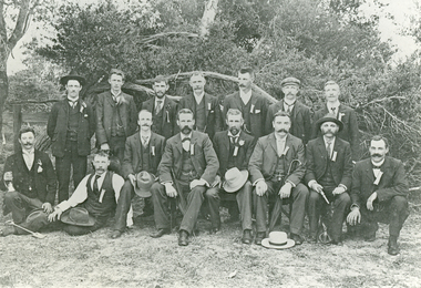 Black and white photo of men at picnic from the Australian Tessellated Tile Company. 