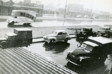 Black and white photo of snow falling in Mitcham looking north August 1951.