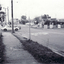 Black and white photo of Railway Crossing, Mitcham Road, looking north