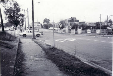 Black and white photo of Railway Crossing, Mitcham Road, looking north