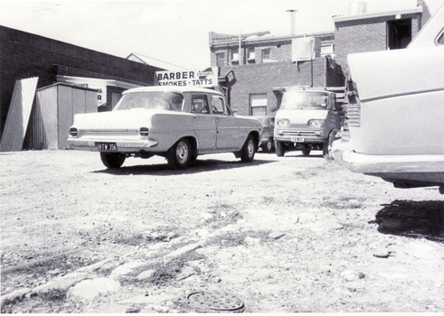 Black and white photo of back of shops on north side of Whitehorse Road, Mitcham
