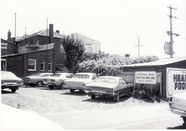 Black and white photo of back of shops and banks, south side of Whitehorse  Road, Mitcham