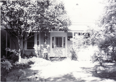 Black and white photo of Station Master's House, Station Street, Mitcham - was immediately alongside railway line - is now carpark.