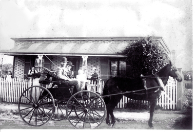Black and white photo (2 copies) of horse drawn 