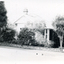 Black and white photo of original Police station in Blackburn.  Constable Costello in charge
