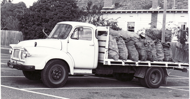 Black and white photo of W.R. & R.F. Raftis Delivery Truck taken in 1977.