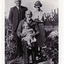 Black and white photo of Charles Toogood (standing) Richard Toogood (seated) Vera Luscombe nee Toogood (standing) and June Luscombe