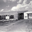 Black and white photo of entrance to Blue Moon Fruit Co-Op