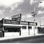Black and white photo of Fisher Real Estate offices