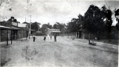   Black & white photo of Blackburn Road looking North from railway gates