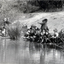 Physical description  Black and white photo of children from Blackburn Lake Primary School fishing for yabbies in the Blackburn Lake Sanctuary in 1974.