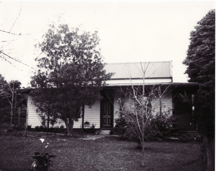 Black and white photo of orchardist's house built about 1880-1900.