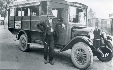 Black and white photo of Vermont Bus 1925, driver Mr. Tom Brockell.