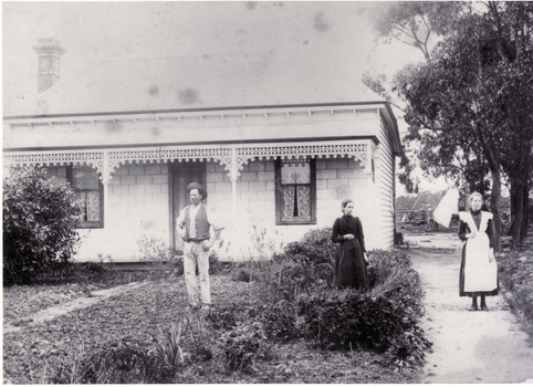 Black and white photo of Cook Family in their front garden, Mitcham, 1898.