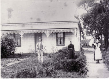 Black and white photo of Cook Family in their front garden, Mitcham, 1898.