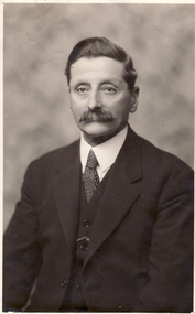 Black and white photo of H.T. Bishop, J.P. Shire Secretary of Blackburn and Mitcham 1925.