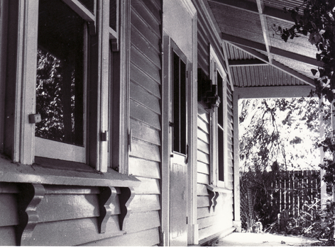 Black and white photo of Station Master's House, Mitcham showing the veranda.