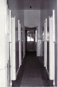 Black and white photo of  the interior of Station Master's House Mitcham.