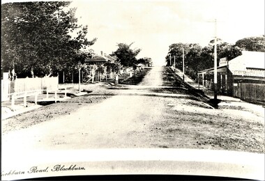  Black and white photo of Blackburn Road, Blackburn.  Shop on corner.