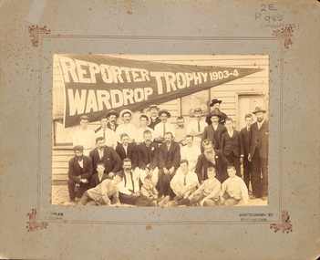 Black and white photo mounted on board of Cricket Team 