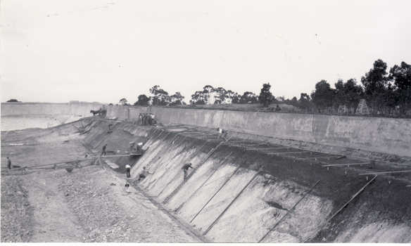 Black and white photo of Construction of Mitcham Reservoir.   Taken in 1922.  Photograph of southern retaining wall nearby Lucknow St.
