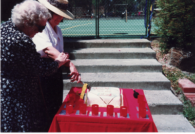Photograph, Mrs  Cath Waugh cuts Celebratory Cake at St. John's Church, 2/02/1992 12:00:00 AM
