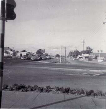 Black and white photo of Mitcham and Whitehorse Road corner. Looking East. 