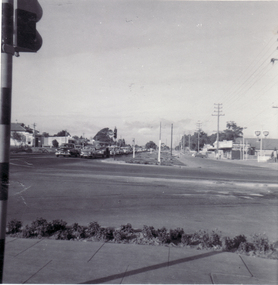 Black and white photo of Mitcham and Whitehorse Road corner. Looking East. 