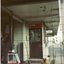 Coloured Photo of Mitcham Railway Station. Prior to/during renovations.  View to the west and staff office door.