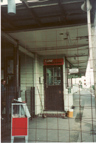 Coloured Photo of Mitcham Railway Station. Prior to/during renovations.  View to the west and staff office door.