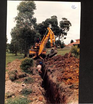 Council Workers Digging Trench.