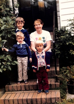 Coloured photo of Women with 3 Boys