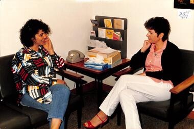 Coloured photo of Maree Buckle & Peni Michael at Community Services.