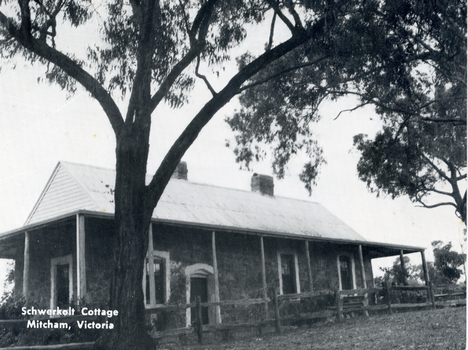 Black and white postcard of rear of the cottage.