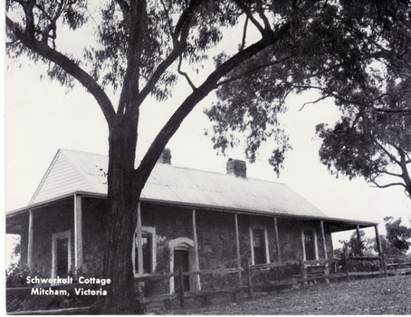 Black and white Postcard of Back view of Schwerkolt Cottage.