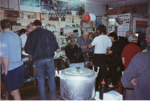  inside Rob's Shop with George Robinson serving customers 