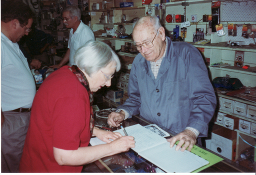 George Robinson and Valda Arrowsmith signing the Visitors Book, on the occasion 