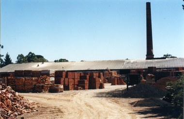 Photo taken of Daniel Robertson Brickworks Storage Area and Chimney, looking North towards Station Street.