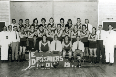 Vermont Football Club Team taken in a Hall holding Premiership Flag. Premiers of 1971.