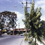 Corner of Canterbury, Mitcham & Boronia Roads, Vermont, looking towards Boronia Road, showing Vermont Shops and corner of Vermont Primary School, since demolished.  Inscriptions and Markings
