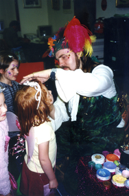  Children having their face painted by Jason the Fairy Tale Man at 1999 Wisteria Party.