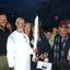 Society members and ex Olympian, Bob Gardiner, carrying the Olympic Flame along Springvale Road between Burwood Highway and High Street Road