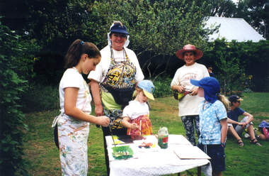 Children taking part in Painting Display at Society's Open Day at Schwerkolt Cottage & Museum Display for Heritage Festival 2000. Barbara Rogalski and Joan Henwood assisting.