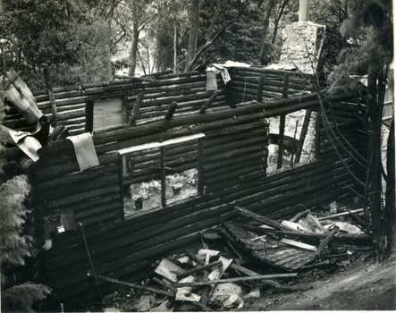 Remains of Toc H log cabin after fire in March 1960