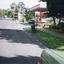 North Service Road in Whitehorse Road, Mitcham, looking west to shop and Service Station on the corner of Alexander Street Mitcham.