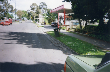 North Service Road in Whitehorse Road, Mitcham, looking west to shop and Service Station on the corner of Alexander Street Mitcham.