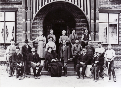 Mr and Mrs Abrahams, Superintendents of the Adult Deaf and Dumb Society at Blackburn. They are in centre of group.